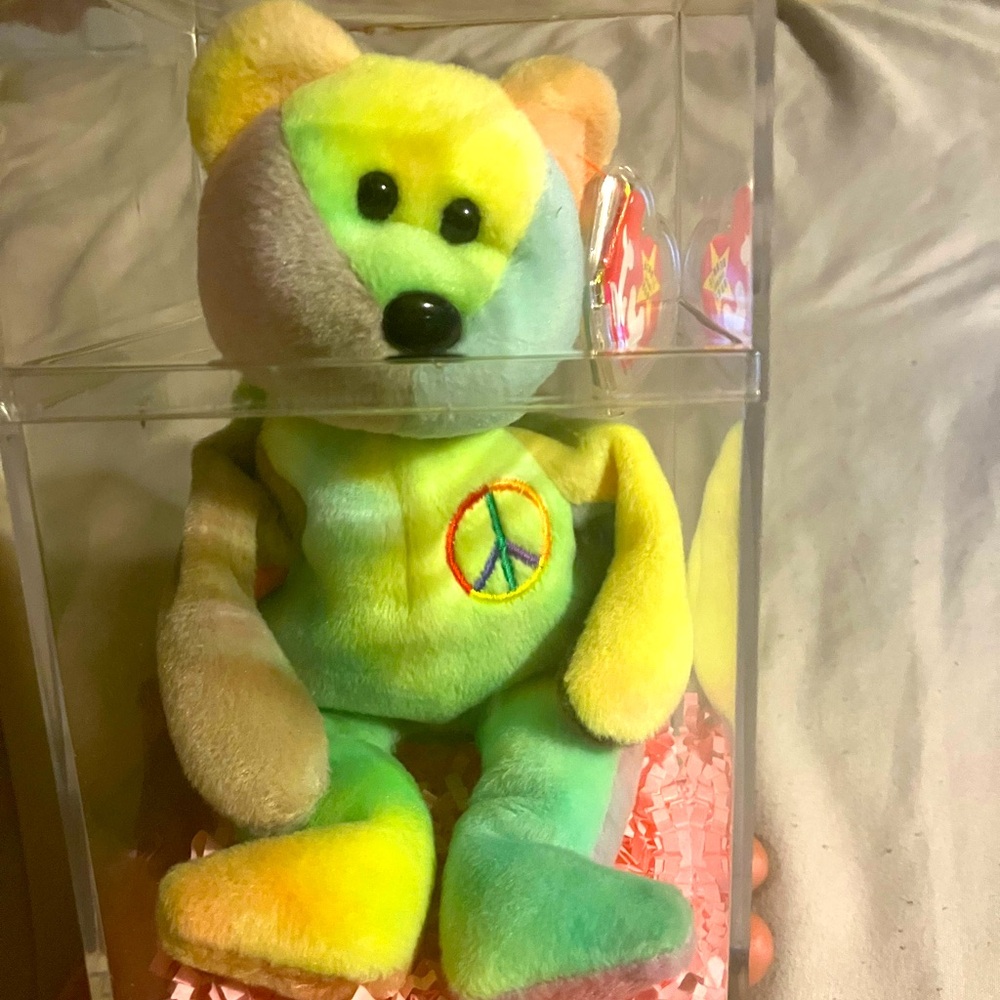 Ty 1996 peace bear beanie baby.